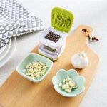 garlic-press-with-2-stainless-steel-blades-effortless-garlic-cube-crusher-chopper-cutter-squeezer-home-kitchen-hand-tool – 1